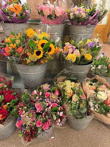 istock Flower Bouquets in Silver Galvanized Buckets 2207685696