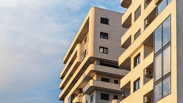 istock Modern apartment building with curved balconies in sunlight, Bar, Montenegro 2207693178
