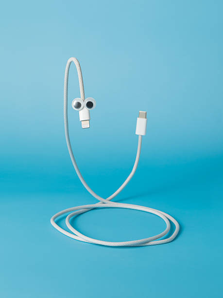 istock Lightning to USB-C cable with snake eyes, blending technology with a playful design 2207694303