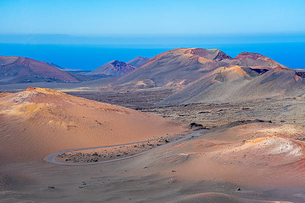 istock Asphalted road in Timanfaya park. 2207697772