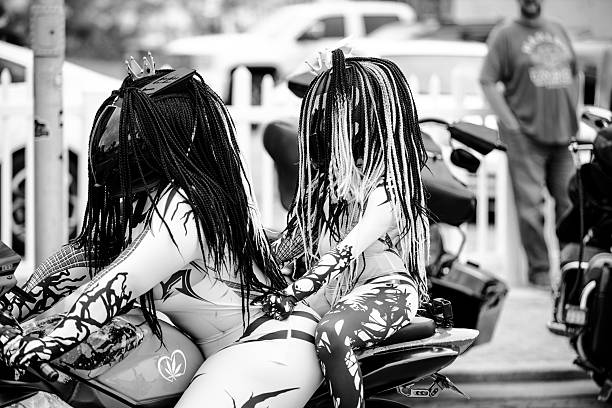 Riders and event goers at the 2025 Daytona Bike Week. The event is held every March in Daytona Beach, FL. Motorcycle Enthusiasts come from around the world for this week long event. All types of motorcycles are allowed from custom Harley Davidson to scooters. The people who walk the streets enjoying the event provide as much entertainment as the motorcycles themselves.