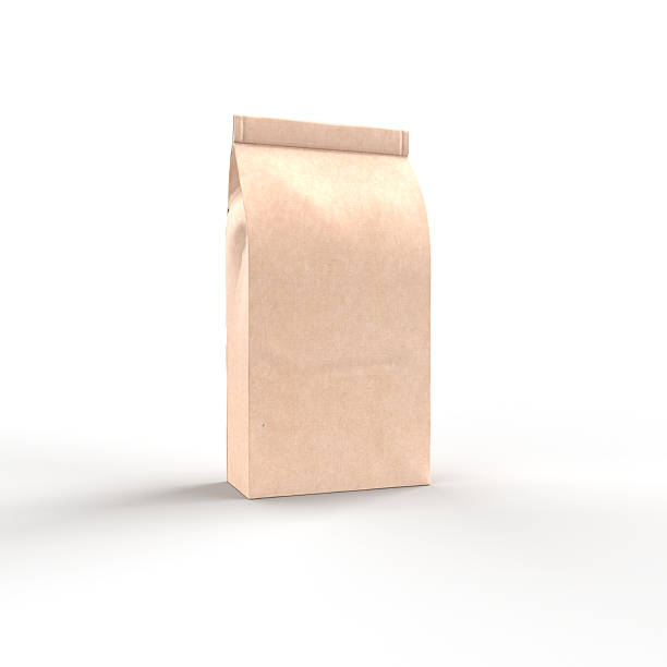 istock Brown paper bag standing up against white background 2207698938