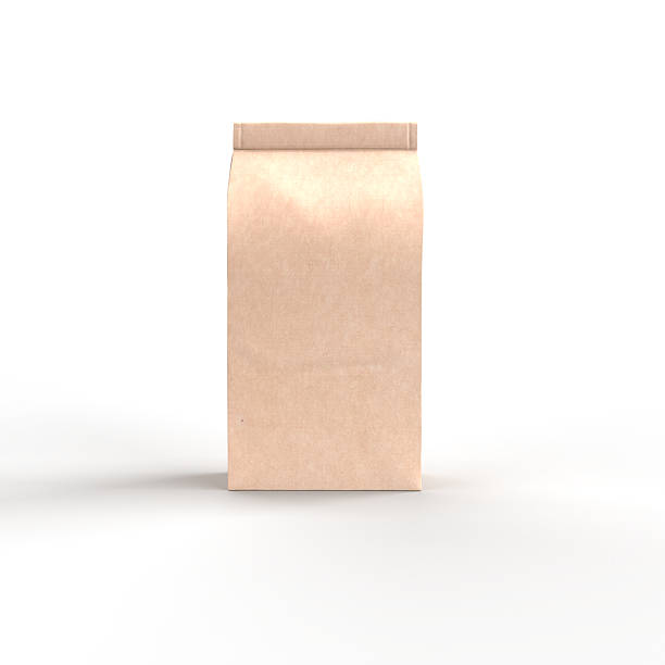 istock Brown paper bag standing up against white background 2207698942