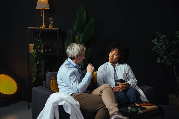 istock Doctors chatting during a break in the hospital lounge 2207702982