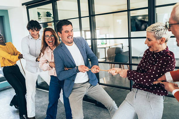 istock Office Team Tug-of-War Challenge 2207703539