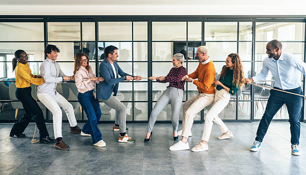 istock Office Team Tug-of-War Challenge 2207703540