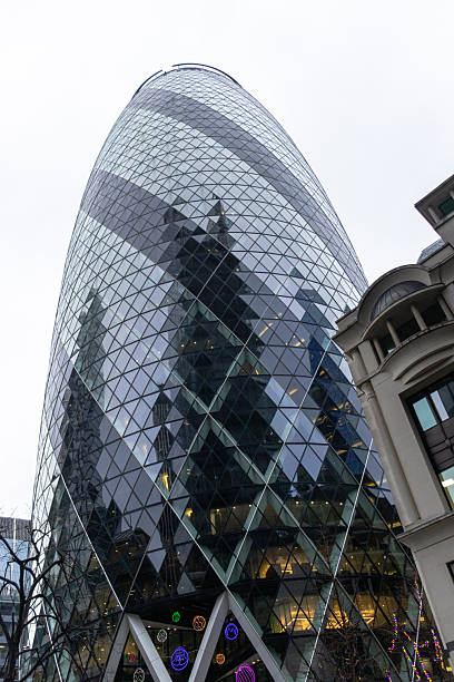 istock A tall building with a glass facade and a large window 2207706402