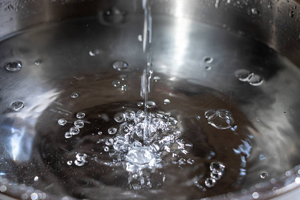 istock Water flowing down and bubbling on the water surface 2207706423