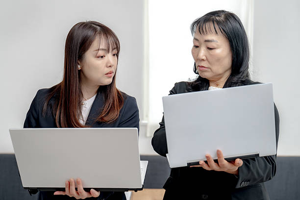 istock PC and business woman 2207714779