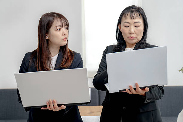 istock PC and business woman 2207714780