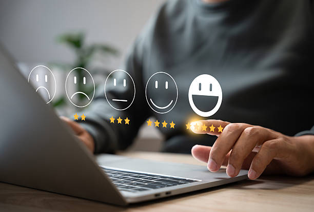 istock Customer satisfaction survey concept, Businessman using smartphone touch happy smiley icon, 5 star service experience rating, Feedback, Online review, Online application, Quality satisfaction review. 2207720375
