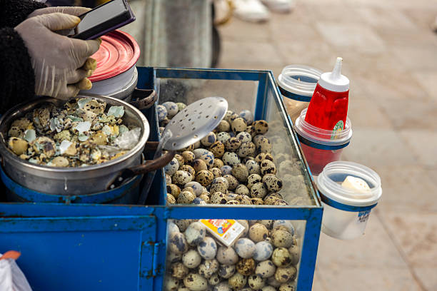 A street vendor selling quail eggs