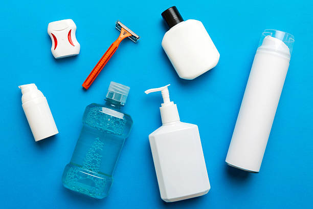 istock Mockup for bathing products top view flat lay, spa razor, toothpaste, soap, gel and other various accessories. Cosmetics for skin health. Bath Mockup for your logo 2207729267