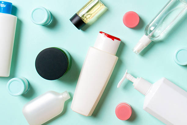 istock Group of plastic bodycare bottle Flat lay composition with cosmetic products on colored background empty space for you design. Set of White Cosmetic containers, top view with copy space 2207729271