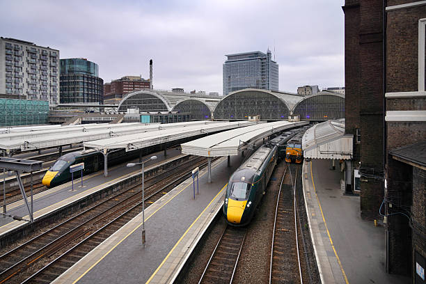 London underground train arriving at a station platform