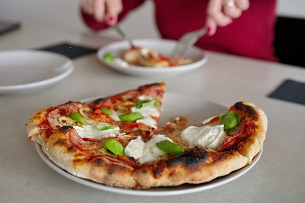 istock Piece of homemade pizza 2207729869