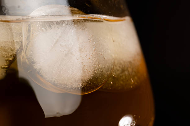 istock transparent glass with cold apple juice with ice 2207730323