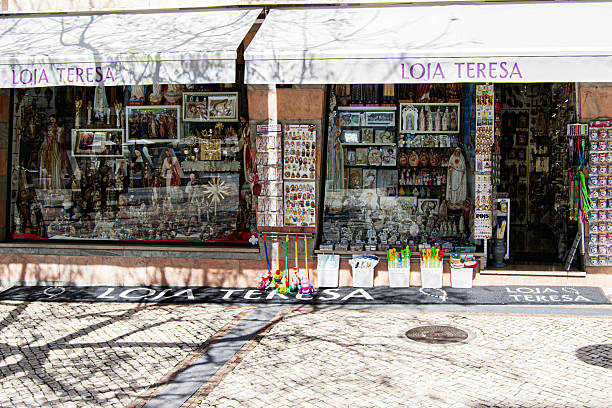 Lisbon, Portugal - March 12, 2024: Traditional souvenir objects in a small business retail display in the market. The city is known for the quality of its ceramics