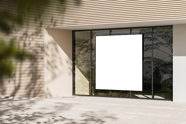 istock Blank billboard mockup on modern building facade with glass windows. 3D Rendering 2207742416