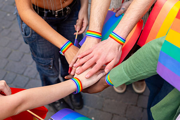 istock Activists showing support for lgbtq plus rights and equality 2207743373