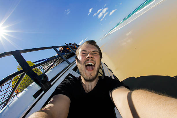 A backpacker enjoys a fun boat ride along the shoreline, grinning widely as the ocean waves crash nearby. The sun shines brightly overhead, highlighting the joyful atmosphere of the beach adventure.