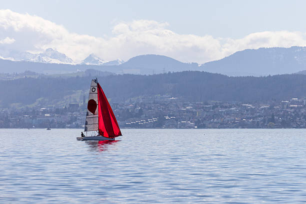 Sailing boat on Lake Constance in backlight