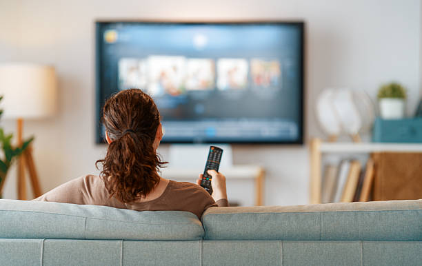 istock Woman watching  TV 2207746577