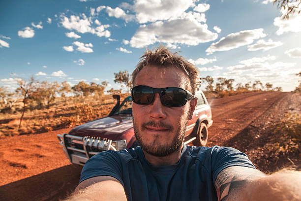 istock Exploring the vast Australian Outback in a rugged vehicle at sunset 2207746844