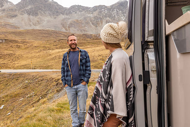 istock Couple enjoys the van life in Autumn 2207749302