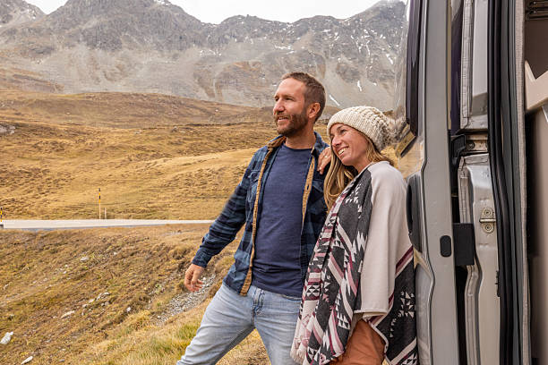 istock Couple enjoys the van life in Autumn 2207749308