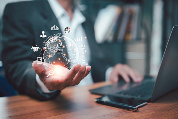 istock A man holding virtual Global Internet connection  Business global internet connection application technology and big data digital marketing, Financial and banking, Digital link tech. 2207750266