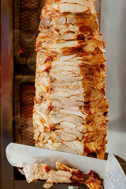 istock Vertical Rotisserie with Seasoned Meat for Shawarma 2207751090