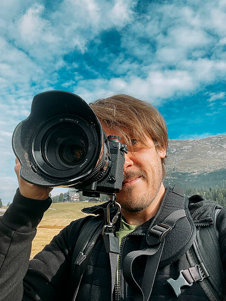 istock Photographer capturing landscape beauty in natural setting during daytime 2207751250