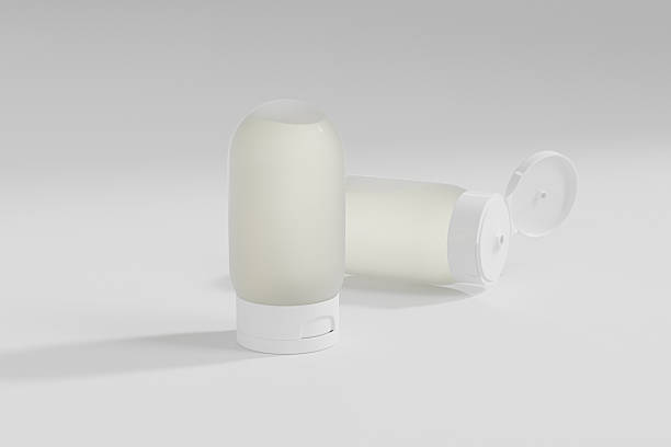 istock Upside down bottle mockup, Squeeze Lotion Bottle with Flip Top Cap packaging, cylindrical liquid containers, front view of inverted shampoo bottle mockup, translucent plastic cosmetic bottle mockup 2207754627