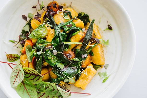 istock Gourmet Gnocchi Dish with Fresh Greens 2207755533