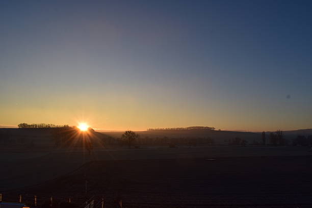 sunrise mood in dark Eifel hills