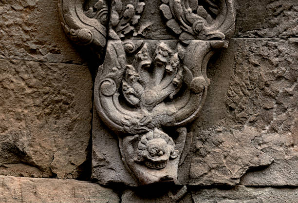 istock little demon holding the six headed snake 2207758169