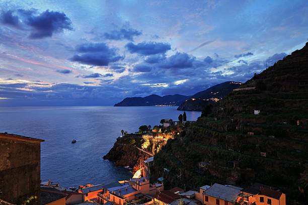istock Cinque Terre evening view with illuminated village. 2207758971