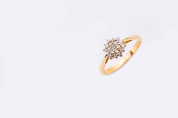 istock Elegant Gold Ring with Diamond Cluster 2207760252
