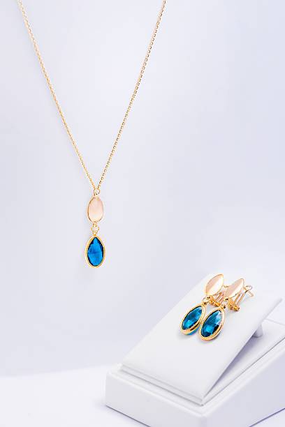 istock Gold Jewelry Set with Blue Gemstones 2207760293