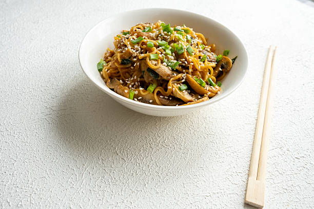 istock cooking instant noodle on white plate 2207760424