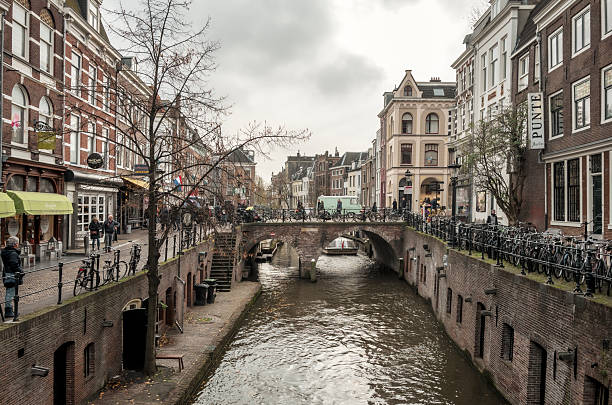 Utrech- Netherlands- Circa November 2019. Typical scene of and Utrecht canal and typicall  Netherlands architecture