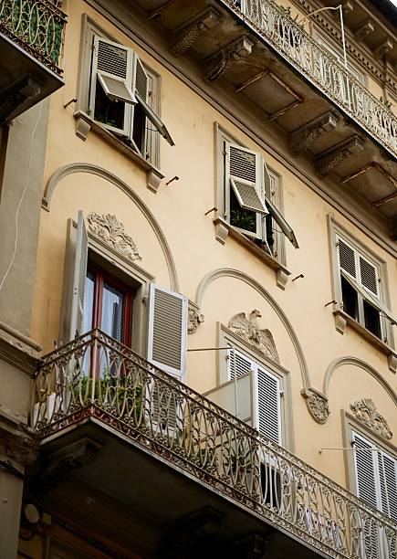 istock Historic European building facade with ornate balconies. 2207764728