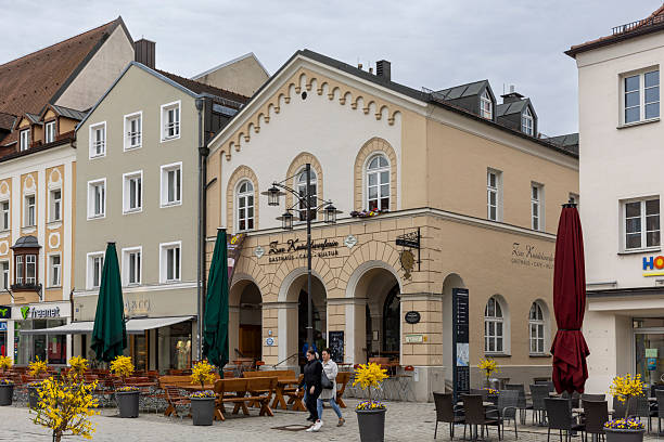 Deggendorf, Germany - Mar 30th 2025: Deggendorf is a small and idyllic city in Bavaria near Austrian border. It's old town is a mixture of narrow streets and historical buildings.