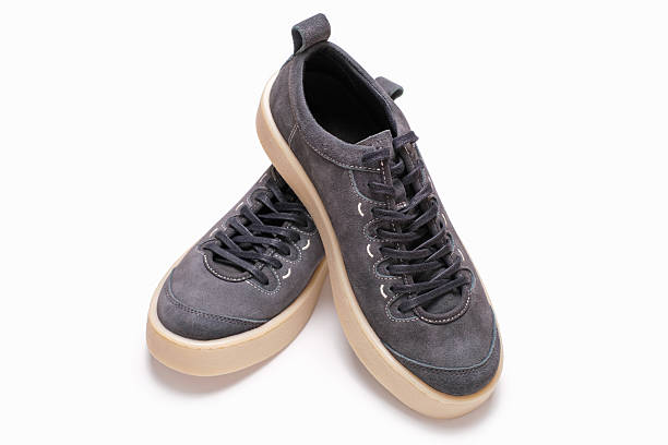 istock Gray sneakers on white background close-up. 2207768916