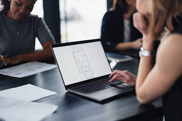 istock Women Collaborating on a Project in Modern Office Environment 2207770878