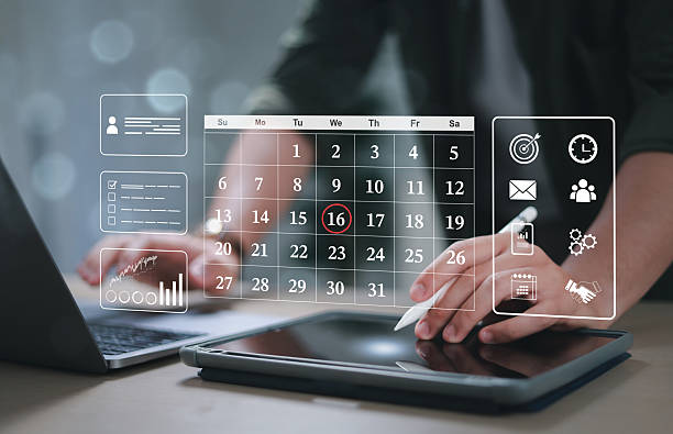 istock Businessman manage business schedule for efficient work. Virtual screen planner calendar. Work plan. Electronic personal organization. 2207772636