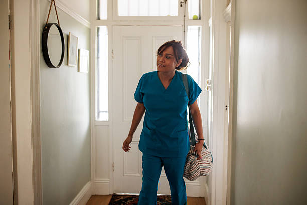 istock Medical Professional Arrives Home After a Long Day 2207776321
