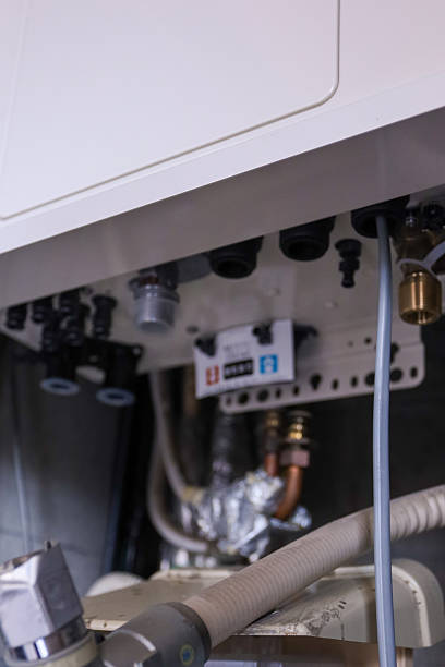 istock Piping during gas water heater replacement work. 2207777769
