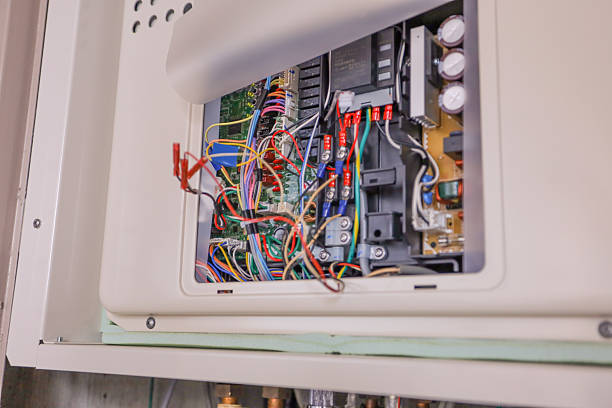 istock Gas water heater replacement work, gas water heater distribution control panel. 2207777831